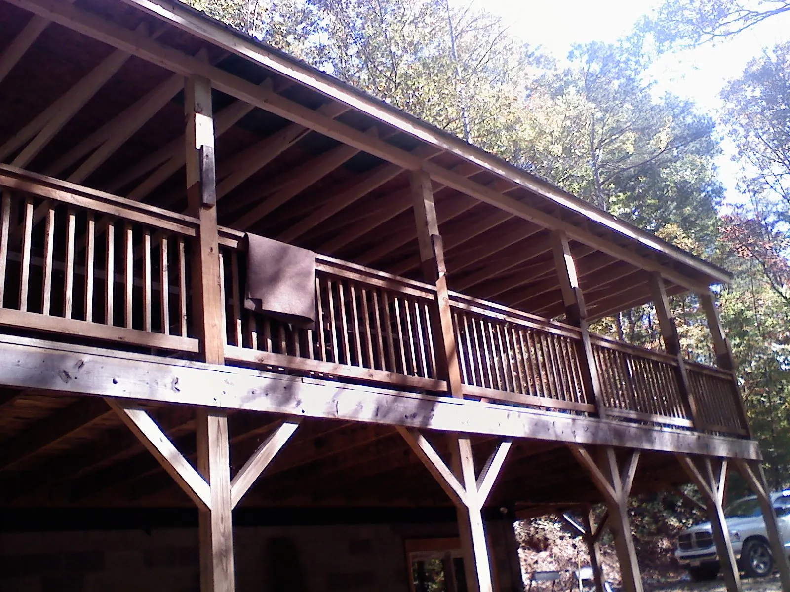Timber framing under a new elevated porch and deck — Roof Leak Repair in Grifton by Roofing Brothers